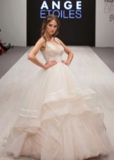 Lush wedding dress with a layered skirt