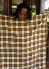 Sarung di Burma - kaedah mengikat daripada kain yang dijahit