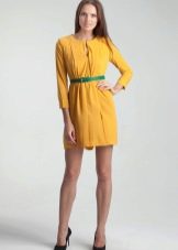 Green belt to yellow dress