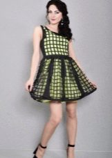 Light green dress with black perforated layer