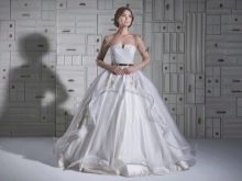 Lush wedding dress with transparent sleeves