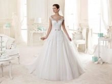 Gaun pengantin off-the-shoulder oleh Nicole Fashion Group