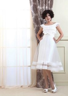 Midi-trouwjurk met doorschijnende gezwollen rok