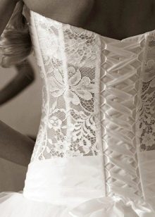 Wedding dress with a closed corset