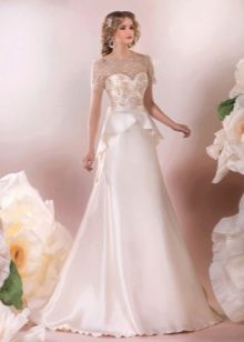 Elegante vestido de novia de corte evasé con peplum