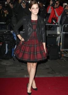 Plaid dress with a layered skirt sun combined with a leather jacket