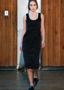 Black fitted dress with drapery