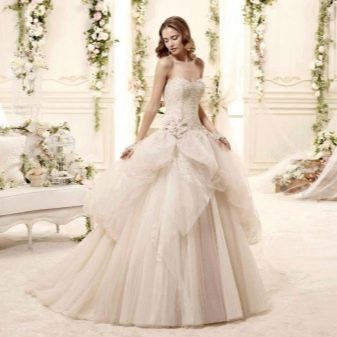 Gaun pengantin yang subur dengan skirt abstrak