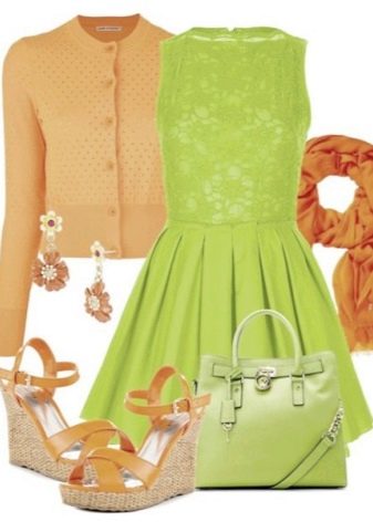 Világos zöld ruha narancssárga kiegészítőkkel kombinálva