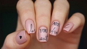 Options for a beautiful manicure with lettering on the nails