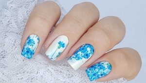 Bright and unusual manicure with cornflowers