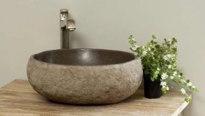Lavabos de piedra en el baño: características, reglas de selección, modelos interesantes.