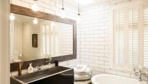 At what height should the bathroom mirror be hung?
