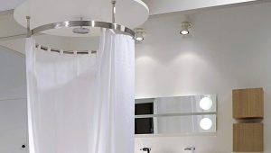 Hogyan válasszunk félkör alakú és kerek fürdőszobai függönyrudakat?