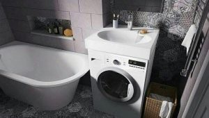 Πλυντήριο ρούχων κάτω από το νεροχύτη στο μπάνιο: χαρακτηριστικά, λεπτές λεπτομέρειες επιλογής και τοποθέτησης