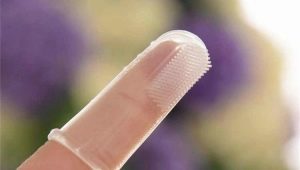 Features of finger brushes for cleaning teeth in babies