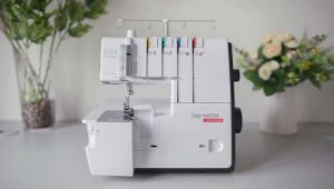 How is an overlock machine different from a sewing machine?