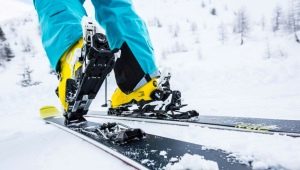 Kā ieeļļot slēpes ar parafīnu?