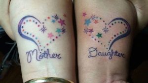 Pair of tattoos for mom and daughter