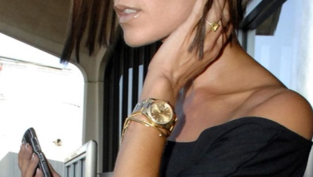 Reloj de oro para mujer con brazalete de oro.