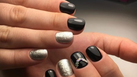 Hoe krijg je een manicure in zwart met zilver?