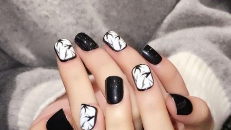 Opciones de manicura en blanco y negro para uñas cortas.
