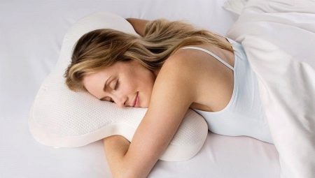 Bagaimana untuk memilih bantal untuk tidur di perut anda?