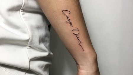 Tattoo in the form of inscriptions on the arm