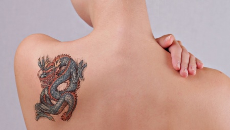 What do dragon tattoos mean and where to stuff them?