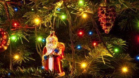 Paano magandang palamutihan ang isang Christmas tree na may isang garland?