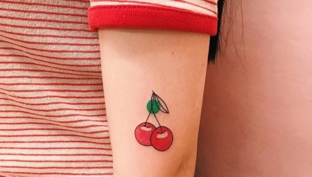 Variants of the image of a cherry for a tattoo