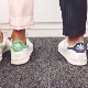 حذاء رياضي أبيض من Adidas
