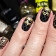 Zwarte manicure met goud: stijlvolle ideeën en techniekopties