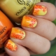 Kamangha-manghang dilaw-orange na manicure