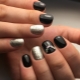 Hoe een manicure in zwart met zilver regelen?