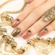 Manicure con elementi di colore oro: caratteristiche dell'arredamento e tendenze della moda