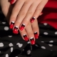 Ongewone manicure-ideeën in een combinatie van witte, rode en zwarte tinten