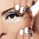 Inlaid nails with stones and rhinestones