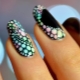 The design of a stylish manicure with dots is also approximate.