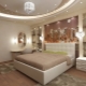 Χαρακτηριστικά και επιλογές φωτισμού για ένα υπνοδωμάτιο με τεντωμένες οροφές