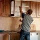 Kaip aukštai turėtų būti pakabintos virtuvės spintelės?
