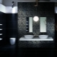 Black tiles in the bathroom: design options and care tips