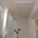 Plafond wasdrogers op het balkon: variëteiten, selectie, installatie