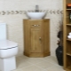 Éviers d'angle avec meuble sous-vasque dans la salle de bain: variétés, recommandations de choix