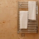 Električne grijane držače za ručnike za kupaonicu: sorte, izbor, ugradnja