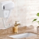 Wall-mounted hair dryers: pros and cons, brands, choice, operation