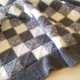 Knitted patchwork plaid