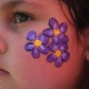 Face painting with the image of flowers