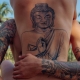 Budistu tetovējumi: simboli un to nozīme
