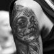Скици и значение на татуировката Санта Муерте